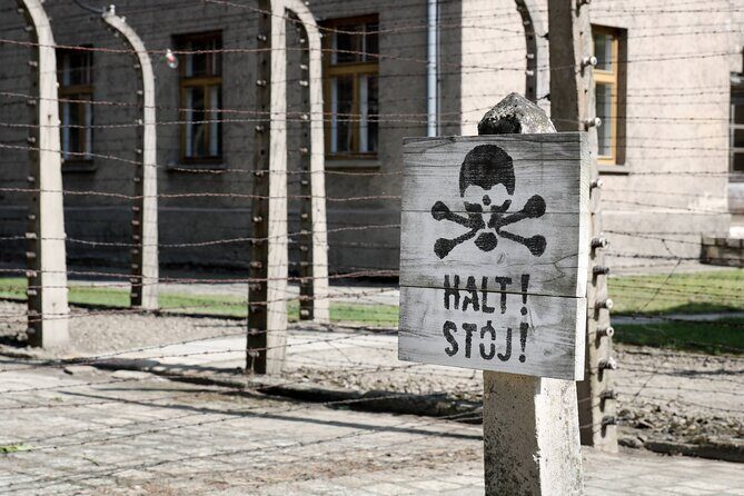 Auschwitz Birkenau Guided Tour with Hotel Pickup from Cracow - Breaks, timing, and your return to Kraków