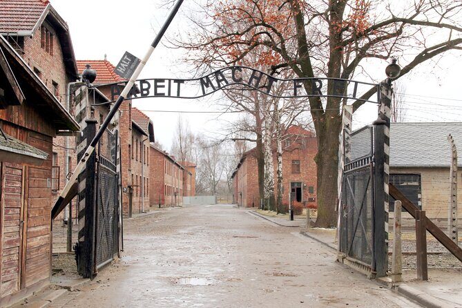 From Krakow: Auschwitz-Birkenau Memorial and Museum Guided Tour - Visiting Auschwitz: Buildings, Artifacts, and Prisoner Life