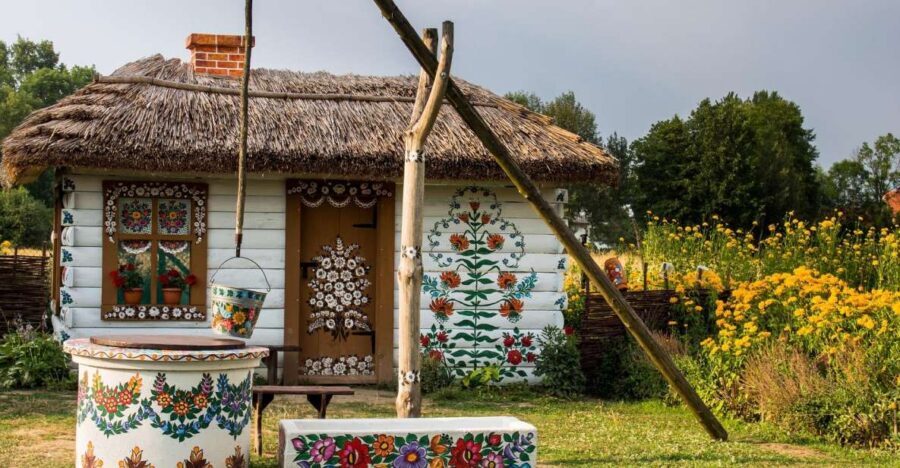 From Krakow: Guided Tour of Zalipie - Entering Zalipie: Painted Walls, Crepe-Paper Flowers, and Paper Cuts