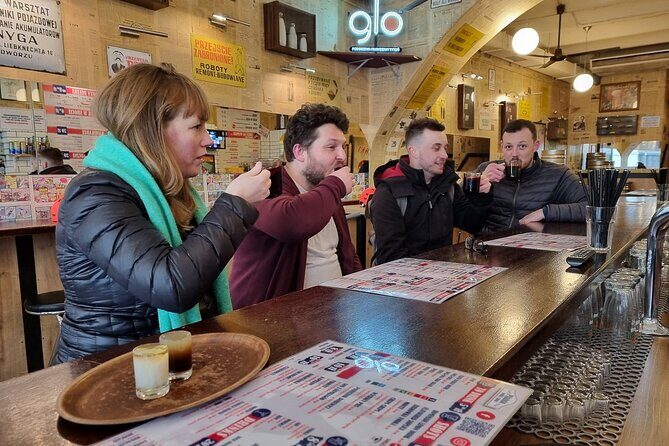 Krakow City Tour on Scooter and Food Tasting with English Guide - Stop 5: Ulica Kanonicza—old tenements and restaurant lanes