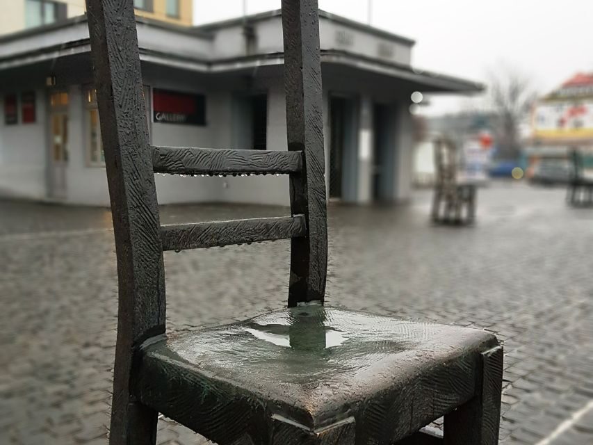 Krakow: Jewish Quarter and Former Ghetto Tour by Golf Cart - Ghetto Heroes Square: empty chairs and the story behind the markers