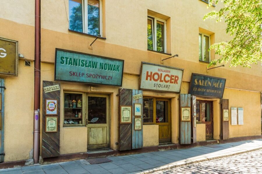 Krakow: Jewish Quarter and Ghetto Sightseeing Golf Cart Tour - Crossing into Podgórze: where wartime memory takes over