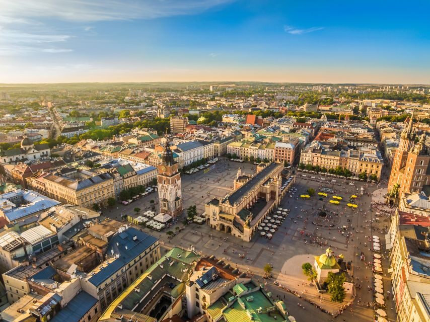 Krakow: Old Town Audioguided walking Tour - Kanonicza Street to Planty Garden Chain: moving from monument to mood