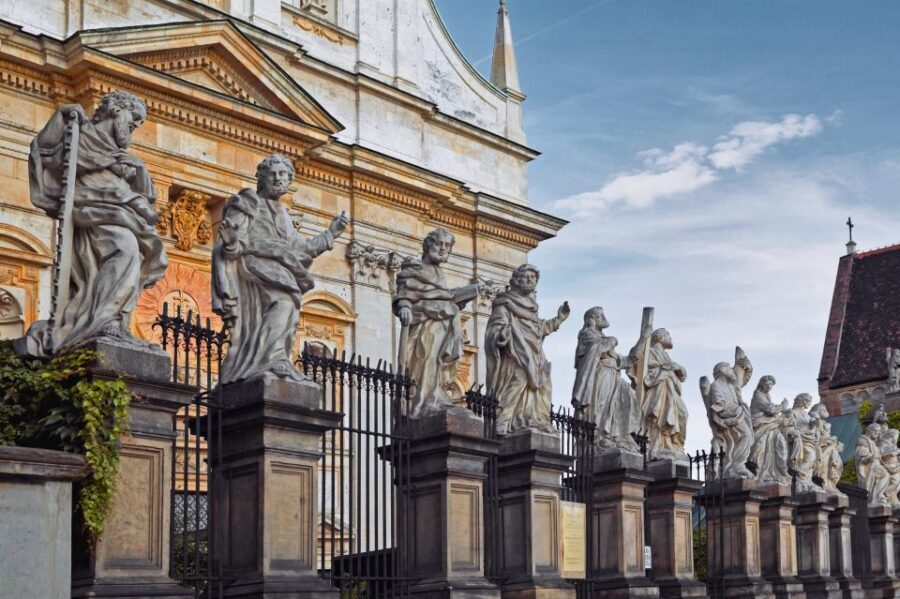 Krakow: Old Town Audioguided walking Tour - Jagiellonian University to Szczepanski Square: scholars and a pre-WWII skyline relic