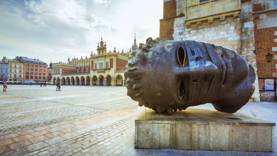 Krakow: Old Town Audioguided walking Tour - Dominican Basilica, Slowacki Theatre, Little Market Square, and electricity