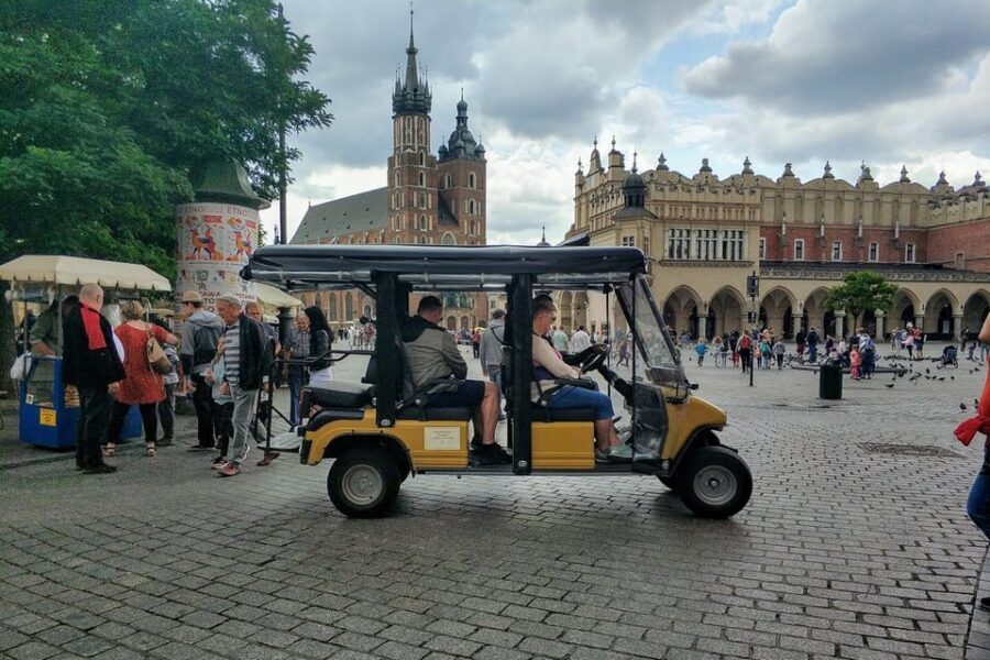 Krakow: Old Town City Tour in a Golf Cart - The Papal Window: a quick landmark with a specific identity