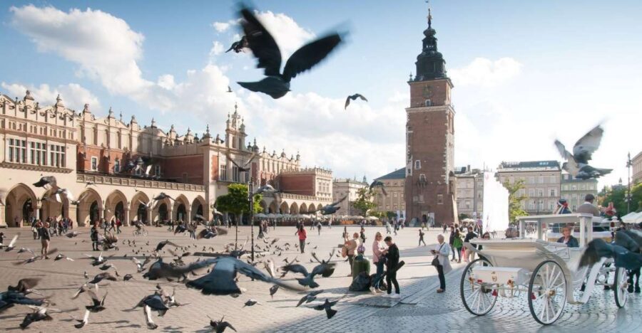 Krakow: Old Town Private Guided Walking Tour - Sukiennice and the Barbican: trade roots and city defense