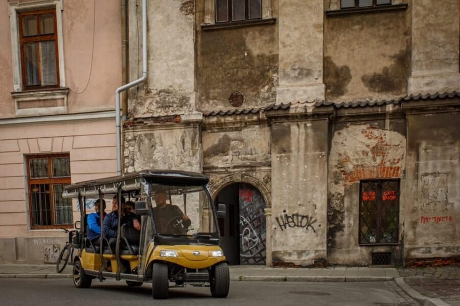 Krakow: Regular Extended City Sightseeing Tour By Golf Cart - Getting started: pickup, group size, and seating reality